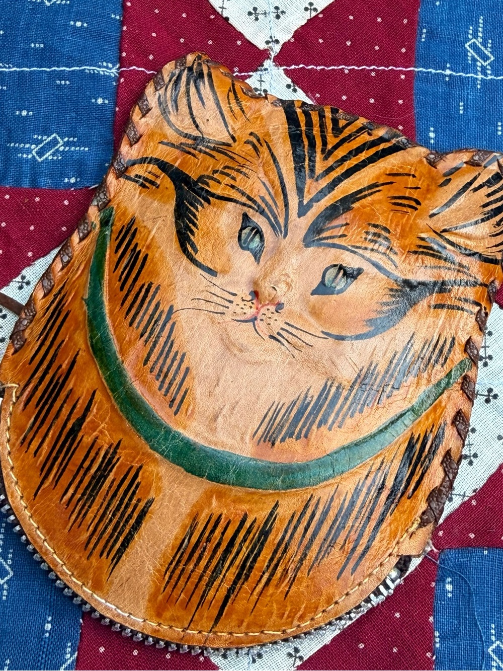 Vintage Brown Leather Cat Pouch with Green Collar Design